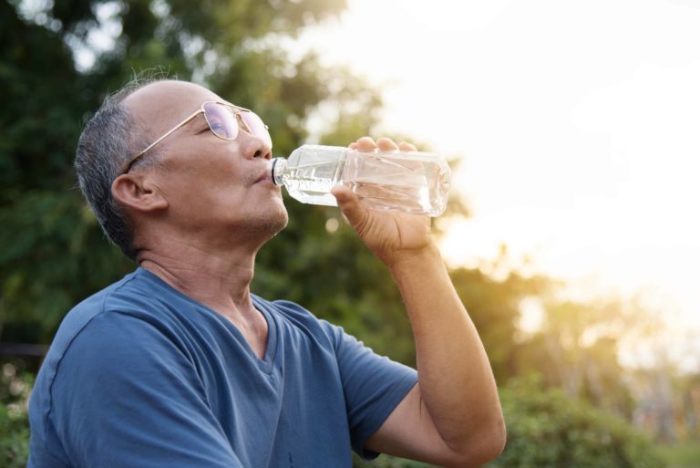 Man Drinking Water - 3 Ways to Beat the Heat