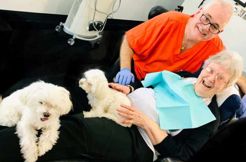 Dean Nicholas, DDS with patient. The importance of oral health for seniors.