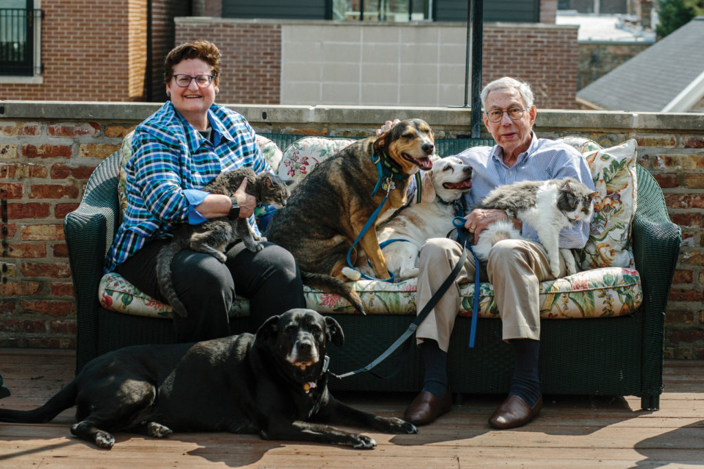 Andie Kramer and AL Harris with their pets. Pet Companionship. Photo by Jim Vondruska