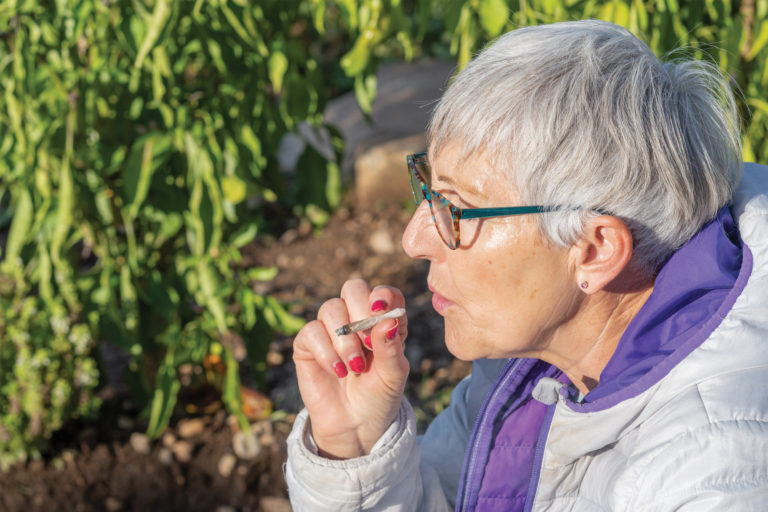 Senior woman smoking marijuana