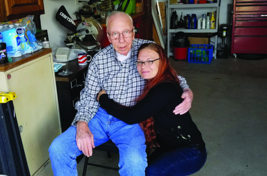 Kim Hauser with her grandfather, Roger Proffer