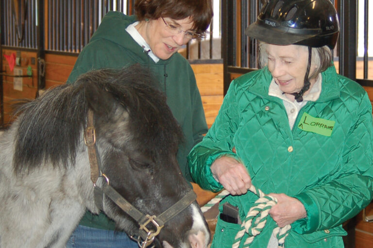 Loraine Bremer and therapeutic riding instructor Sally Stewart. Silver Spurs program, senior program