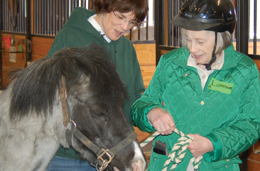 Loraine Bremer and therapeutic riding instructor Sally Stewart. Silver Spurs program, senior program