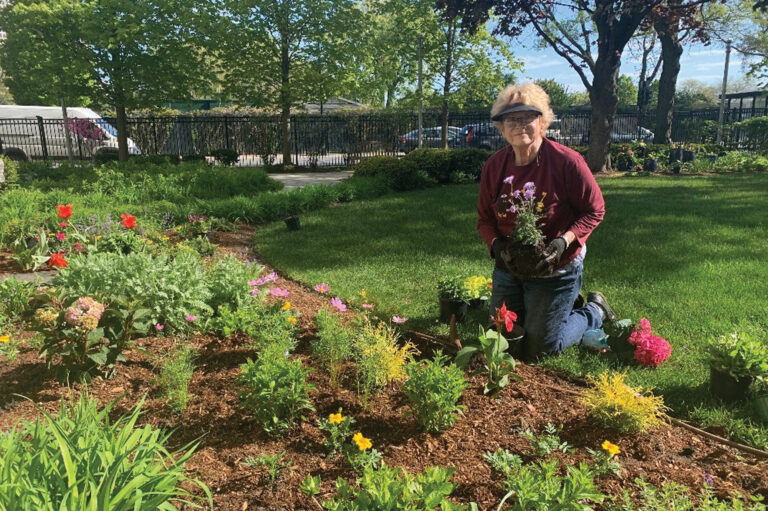 Senior woman gardening. Photo courtesy of the admiral at the lake