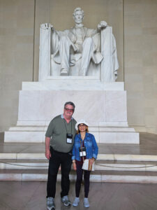 Yolanda Sampan with her husband in front of the Lincoln Memorial in Washington D.C.