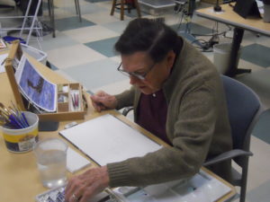 Gordon Guth working on a painting