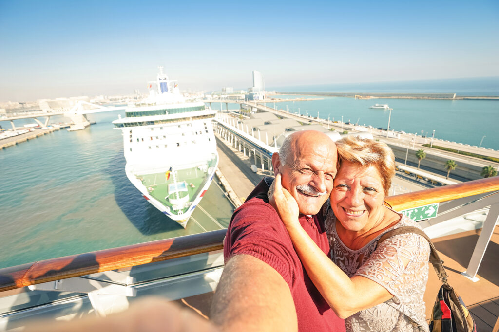 Couple taking a selfie on their ideal winter cruise