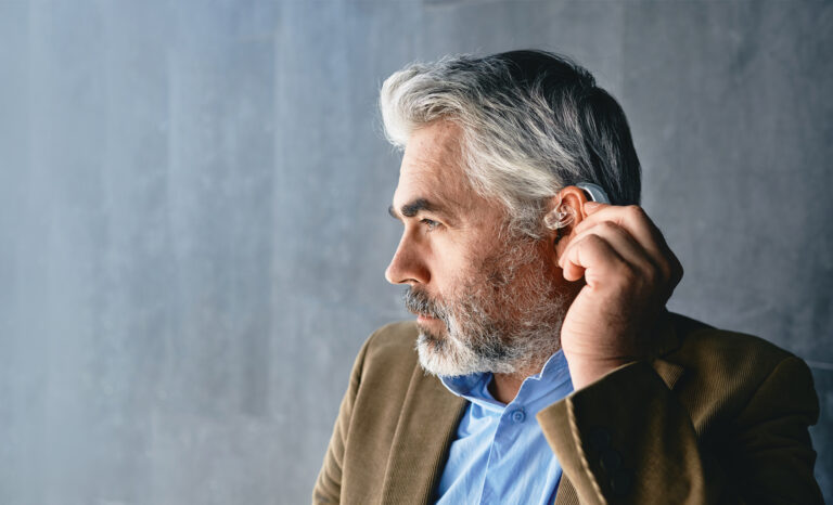 Portrait of a senior man wearing hearing aids