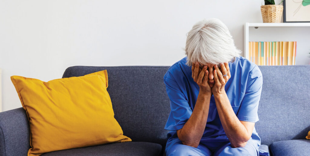 Depressed senior caregiver in isolation
