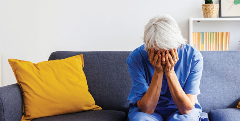 Depressed senior caregiver in isolation