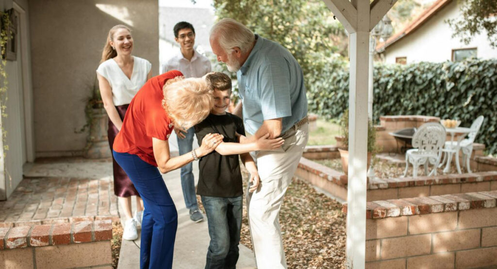 Multigenerational family showing the practicality of long-term care insurance for their protection.
