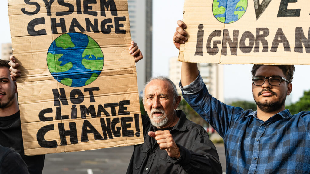 Grey Green Activism. Seniors at a protest about climate change and the environment.